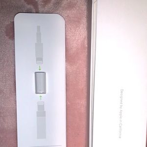 Apple Pencil Lightning adapter, and extra tips.